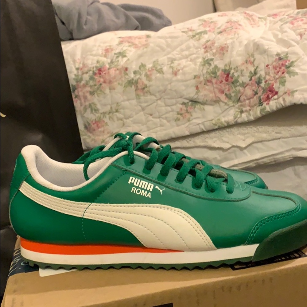 Green and white Puma Roma shoes